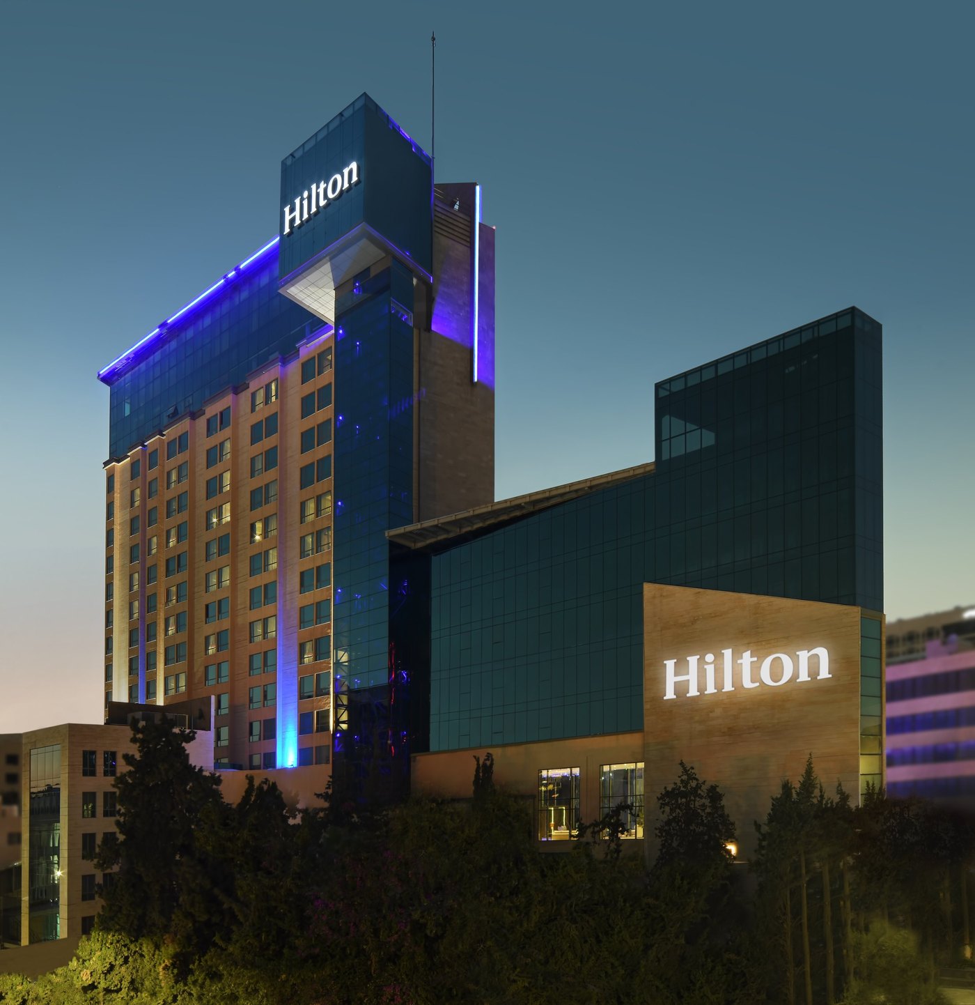 Hilton Amman hotel tower at night